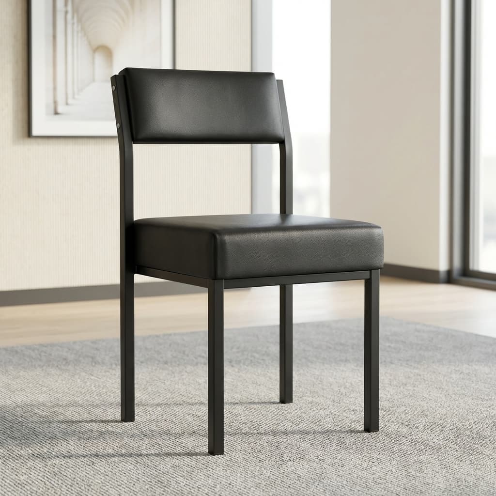A minimalist black executive guest chair featuring a thick square padded seat cushion and a matching rectangular padded backrest, supported by a sleek black metal frame with four straight square legs.
